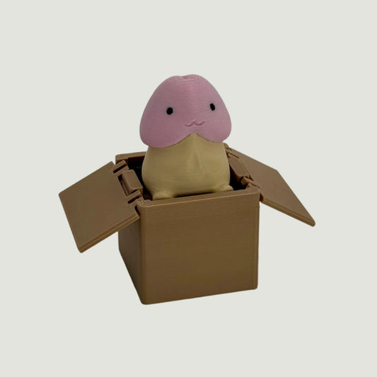 Funny cute 3d printed penis in a box at an off angle